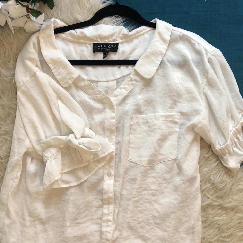 White ruffled blouse